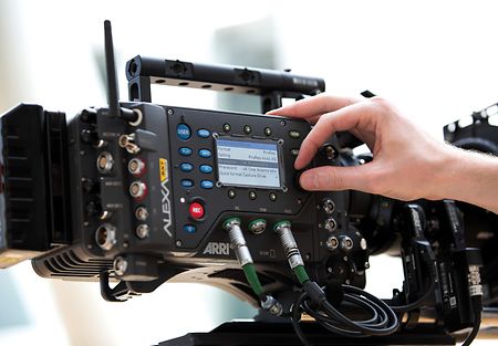 Close-up view of a person working with the arri sxt w. 