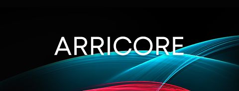 image with white typography in front of blue and green colorful swirls; black background