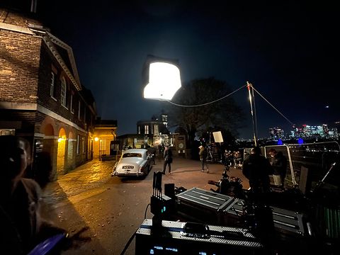 Malavasi and gaffer Tanner used large-scale rigs, moon boxes, and balloon lights to shape night exteriors with depth and atmosphere