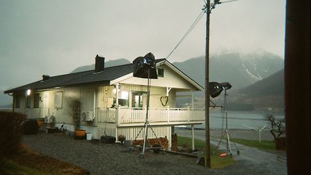 A behind-the-scenes look at the lighting setup on set.