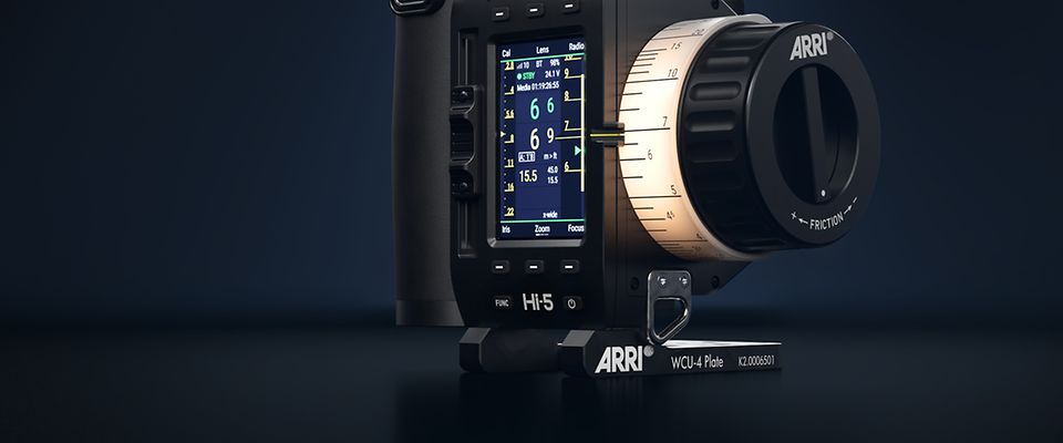 Handheld camera control unit ARRI Hi-5 with WCU-4 plate support in focus. 