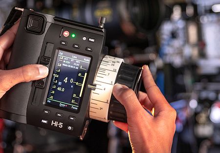 Handheld Camera Hi-5 Control Unit controlled by user.