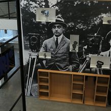 ARRI in Los Angeles - Historic products collection displaying historical products next to a poster of the founder of ARRI