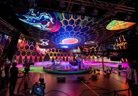 BTS shot of Coldplay's special event, filmed on a virtual production studio to create a supportive and captivating ambiance.