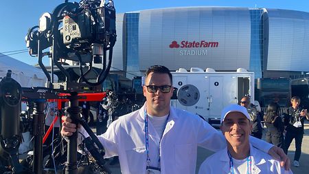 Sean Flannery next to his camera stabilizer TRINITY 2 in front of the State Farm Stadium, where the Super Bowl 2023 was held