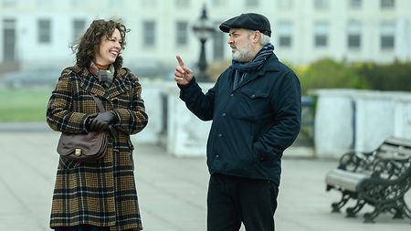 Director Sam Mendes (right) on location with actor Olivia Coleman.