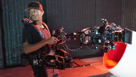 Behind-the-scenes capture of Travis Taddeo operating a Trinity at ARRI Studio NY