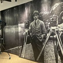 ARRI in Hong Kong - Warehouse entrance highlighting a mural of the ARRI founders, illuminated by an ARRI Orbiter