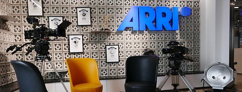 ARRI in Hong Kong - Inviting lobby with seating and prominently displayed awards and ARRI logo in the back surrounded by camera & lighting equipment