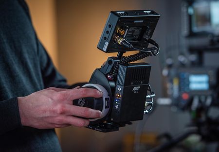 The WVR-1s, which can be paired with ARRI's wireless video transmission system being used on set. 